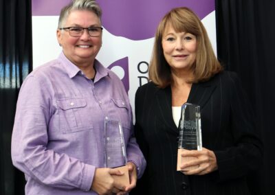 CJ Williams and the Honorable Denise Herman McColley accepting their awards
